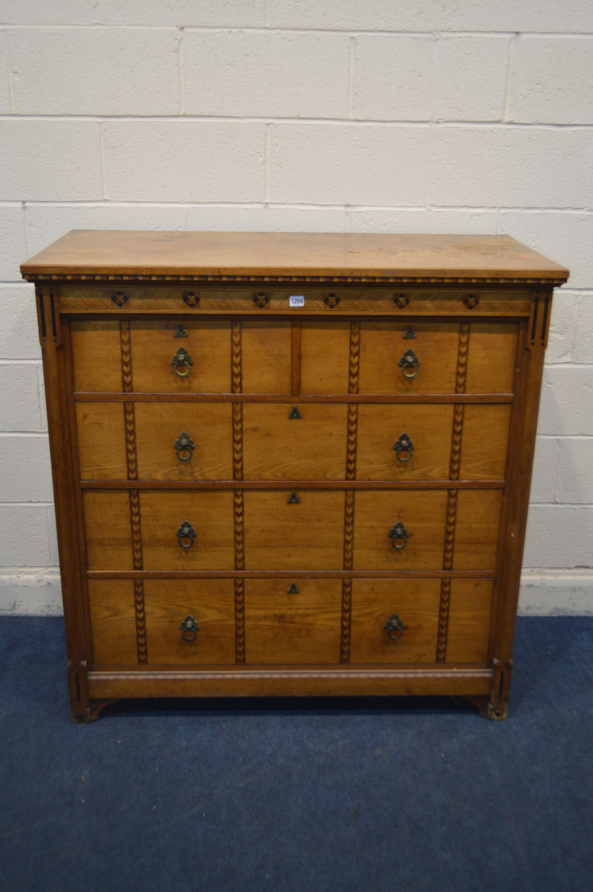 A MID TO LATE 19TH OAK AND PARQUETRY INLAID CHEST OF TWO OVER THREE LONG DRAWERS, in the gothic