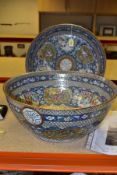 A LATE 19TH CENTURY CANTONESE FAMILLE ROSE CIRCULAR DISH AND MATCHING BOWL FROM A SERVICE MADE FOR