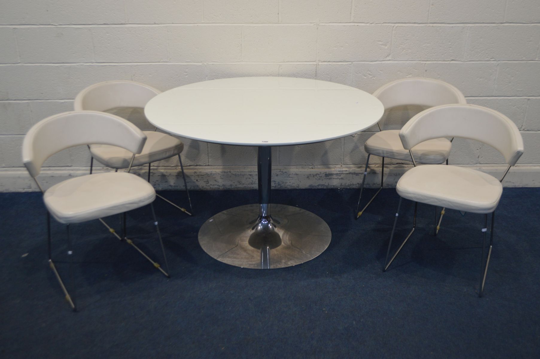 A CALLIGARIS, MODEL PLANET, CIRCULAR DINING TABLE, on a circular chrome base, diameter 120cm x