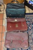 A LATE VICTORIAN GREEN LEATHER GLADSTONE TYPE BAG AND TWO OTHER BROWN LEATHER SOFT BRIEFCASES, the