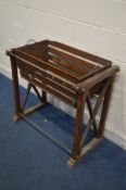 A 19TH CENTURY SCUMBLED PINE ROCKING CRIB/COT, the slatted crib with twin handles, on a removable