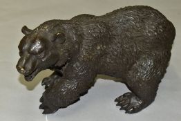 A BRONZED WALKING BEAR SCULPTURE, length approximately 35cm x height 19cm, (Condition:- shows