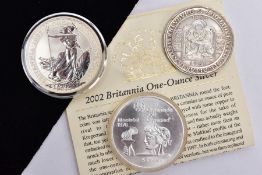 A BRITANNIA 2002 SILVER ONE OUNCE TWO POUNDS, a silver five dollar Montreal Olympic coin, and an