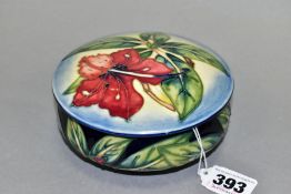 A MOORCROFT POTTERY CIRCULAR BOWL AND COVER, Simeon pattern, blue ground, painted and impressed