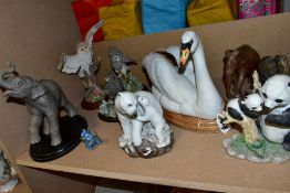 A GROUP OF ORNAMENTS, comprising Goebel 'Mute Swan' on wooden plinth (slight chip to tail), County