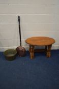 A OVAL TOPPED PINE NEST OF TWO TABLES, and a brass jam pan and a copper warming pan (3)