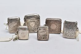 A COLLECTION OF SILVER VESTAS, to include six vestas of various designs such as a detailed foliate