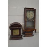 A DISTRESSED MAHOGANY MANTEL CLOCK, with a brass 5inch dial, along with a distressed walnut and