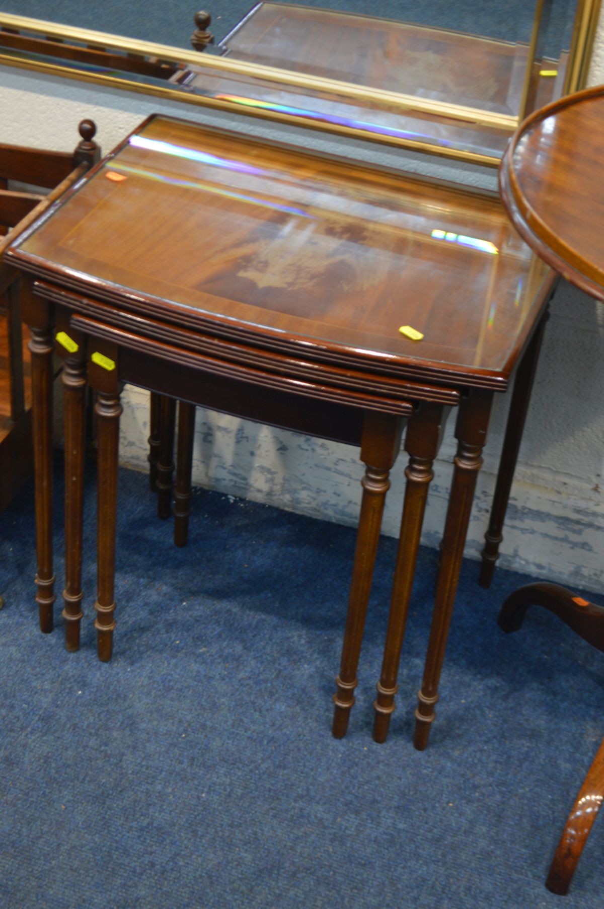 A CIRCULAR MAHOGANY TRIPOD TABLE, diameter 55cm x height 75cm, along with a modern bevelled wall - Image 4 of 5