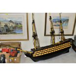 A SCRATCHBUILT WOODEN MODEL OF H.M.S.VICTORY, constructed and painted to a fairly good standard