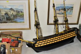 A SCRATCHBUILT WOODEN MODEL OF H.M.S.VICTORY, constructed and painted to a fairly good standard