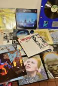 TWENTY LP'S BY DAVID BOWIE AND GENESIS along with attributing artists and a framed Silver Disc for
