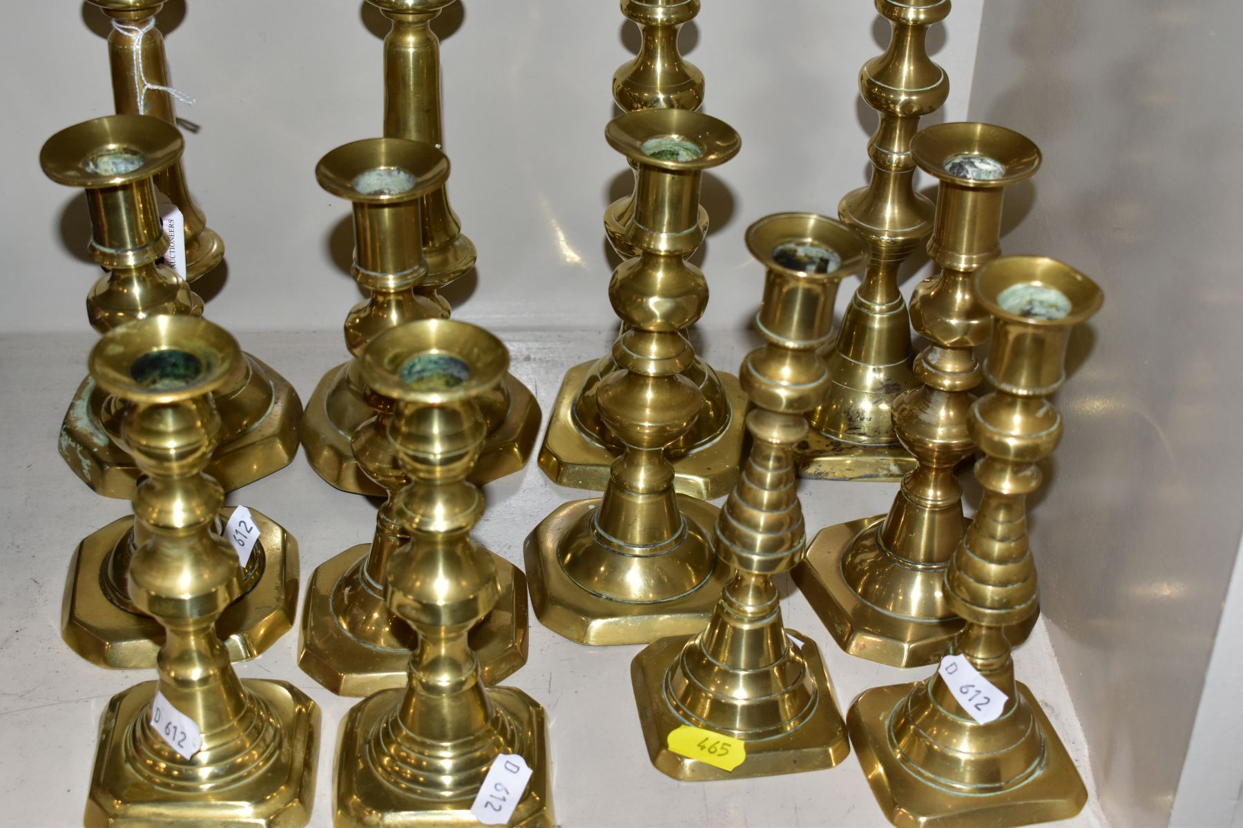 SIX PAIRS OF BRASS CANDLESTICKS, tallest height 22cm and smallest height 16cm, all fitted with - Image 5 of 5