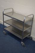 A STAINLESS STEEL THREE TIER CATERING TROLLEY, width 87cm x depth 47cm x height 93cm