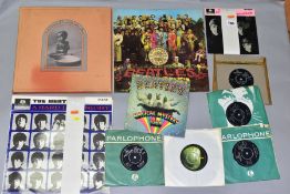THREE LP'S AND SEVEN SINGLES AND EP'S BY THE BEATLES, including A Hard Days Night, Sgt Peppers,