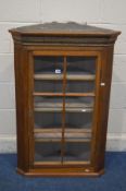 A 19TH CENTURY OAK LEAD GLAZED HANGING CORNER CUPBOARD, with a painted interior, width 73cm x 37cm x