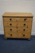 A VICTORIAN AND LATER PINE CHEST OF FOUR LONG GRADUATED DRAWERS, on baluster, width 107cm x depth