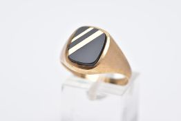 A GENTS 9CT GOLD ONYX SIGNET RING, of a square design, set with an onyx and double gold line