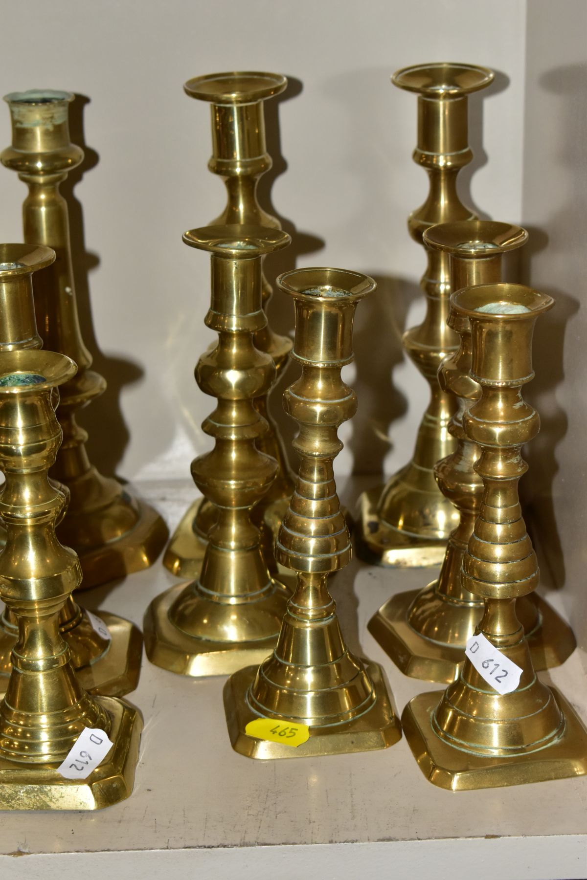 SIX PAIRS OF BRASS CANDLESTICKS, tallest height 22cm and smallest height 16cm, all fitted with - Image 3 of 5