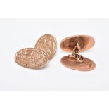 A PAIR OF 9CT GOLD CUFFLINKS, each pair of an oval form with engraved monograms, hallmarked 9ct gold