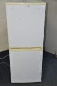 A CURRYS ESSENTIAL FRIDGE FREEZER width 55cm x height 135cm (PAT pass and working @ 2 and -20