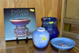 THREE PIECES OF RUSKIN STUDIO POTTERY comprising a pale blue crystalline vase, ginger jar in form,