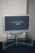 A SONY KZ-42TS1E FLAT SCREEN ANALOGUE TV with stand and remote (PAT pass and working but being