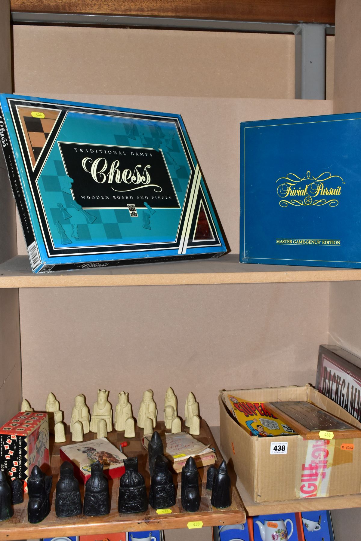 A SMALL QUANTITY OF BOARD GAMES AND COMICS, etc, including a modern wooden chess set, a Trivial
