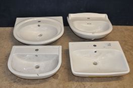 FOUR WHITE MODERN SINKS of various sizes and styles including a Victorian style sink