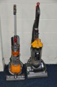 A DYSON DC24 UPRIGHT VACUUM CLEANER together with a Dyson DC33 upright vacuum (2) (PAT pass and