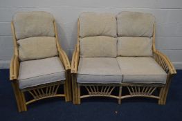 A WICKER TWO PIECE CONSERVATORY SUITE, comprising a two seater settee and an armchair (2)