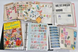 A WORLDWIDE COLLECTION OF STAMPS in a red box, a few commercial covers noted