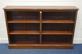 A MAHOGANY DOUBLE SIDED OPEN BOOKCASE, width 153cm x depth 27cm x height 98cm