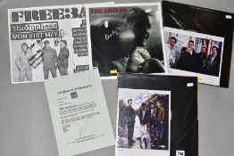AUTOGRAPHED MUSIC PHOTOGRAPHS, three signed photographs and a signed poster featuring the signatures