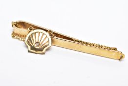 A 9CT GOLD DIAMOND DETAILED TIE PIN, designed with a plain polished bar hallmarked 9ct gold
