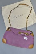 A GUCCI LILAC SUEDE TIGER CHARM HANDBAG, tan leather trims, exterior discoloured and marked, width