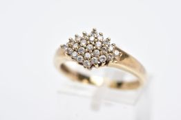 A 9CT GOLD CUBIC ZIRCONIA RING, of a lozenge shape set with circular cut colourless cubic zirconia