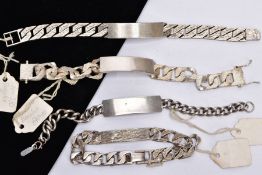 FOUR SILVER IDENTIFICATION BRACELETS, three with plain polished unmarked I.D tags one with an