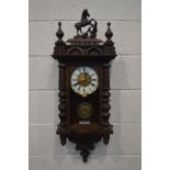 A MAHOGANY VIENNA WALL CLOCK, with a resin horse (missing tail) height 97cm (winding key)