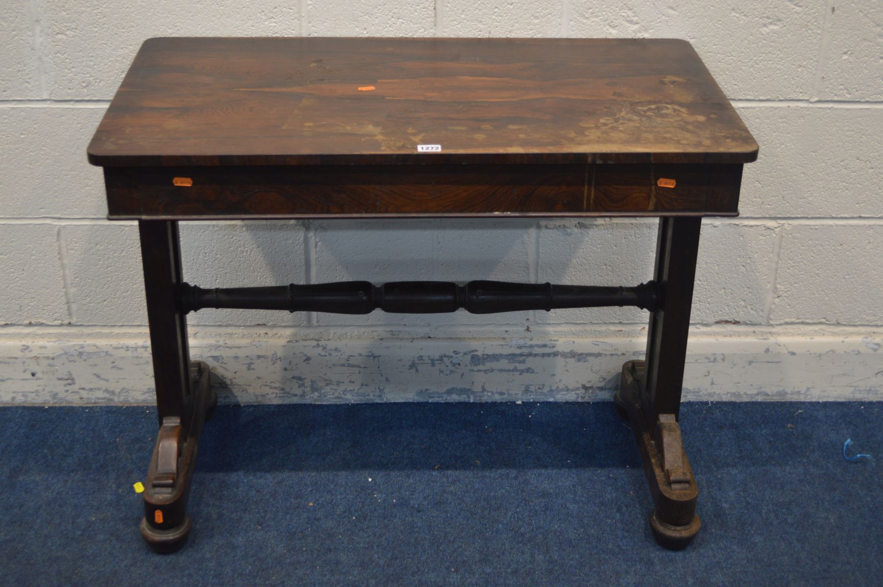 A REGENCY ROSEWOOD SIDE TABLE, with a single frieze drawer, on twin support united by a turned