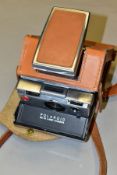 POLAROID SX-70 LAND CAMERA, manual focusing and adjustable exposure control, complete with fitted