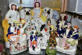 A GROUP OF VICTORIAN STAFFORDSHIRE AND A SMALL NUMBER OF REPRODUCTION STAFFORDSHIRE STYLE FIGURES,