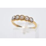 A YELLOW METAL SPLIT PEARL HALF ETERNITY RING, designed with a row of five split pearls, each within