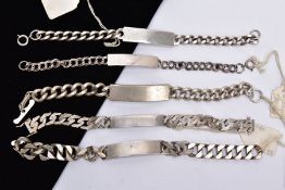 FIVE SILVER IDENTIFICATION BRACELETS, four with a plain polished unmarked I.D tag, fitted with