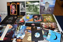 A COLLECTION OF SIXTY FIVE LP'S AND SINGLES OF ROCK MUSIC including Ozzy Osbourne, Queen, Kiss, Guns