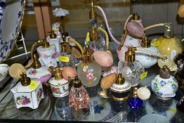 A COLLECTION OF APPROXIMATELY SIXTY FIVE 20TH CENTURY CERAMIC AND GLASS ATOMISERS AND SCENT BOTTLES,