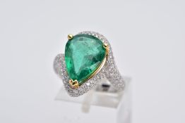 AN IMPRESSIVE LARGE MODERN EMERALD AND DIAMOND PEAR SHAPE CLUSTER RING, accompanied by a report from