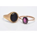 A 9CT GOLD SIGNET RING AND A YELLOW METAL GARNET RING, the gents signet ring of an oval onyx design,