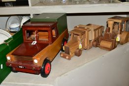 THREE WOODEN TOYS, comprising Land Rover length 51cm x height 27cm, a steam roller length 26cm x