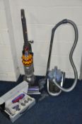 A DYSON DC50 UPRIGHT VACUUM (needs attention) with attachments and boxed Dyson party clean-up kit
